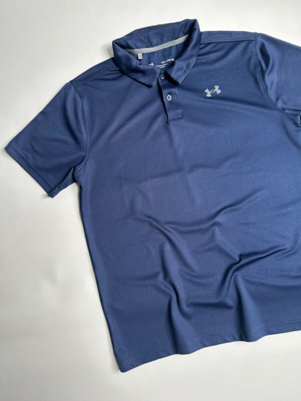 WhatsApp Image 2026-02-19 at 12.23.16 Chomba Under Armour manga corta