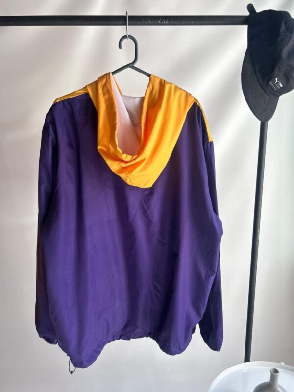 WhatsApp Image 2026-02-26 at 18.29.57 (2) ROMPEVIENTO ESTILO AMERICANO AMARILLO Y LILA