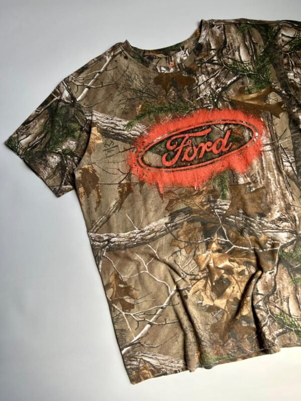 WhatsApp Image 2026-02-27 at 15.11.15 (1) REMERA REAL TREE FORD